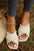 Vada Tassel Woven Crossed Straps Flat Slippers