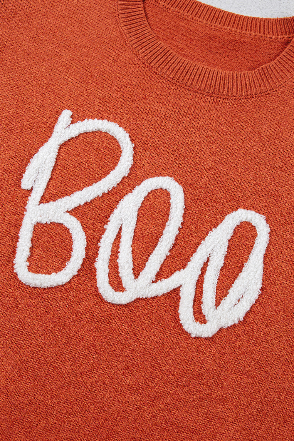 Boo Knitted Pattern Ribbed Edge Sweater