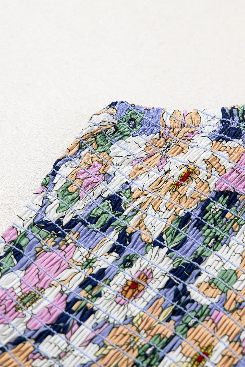 Bloom & Breeze Floral Smocked Jumpsuit