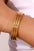 Gold Three Layered Notched Design Bangle