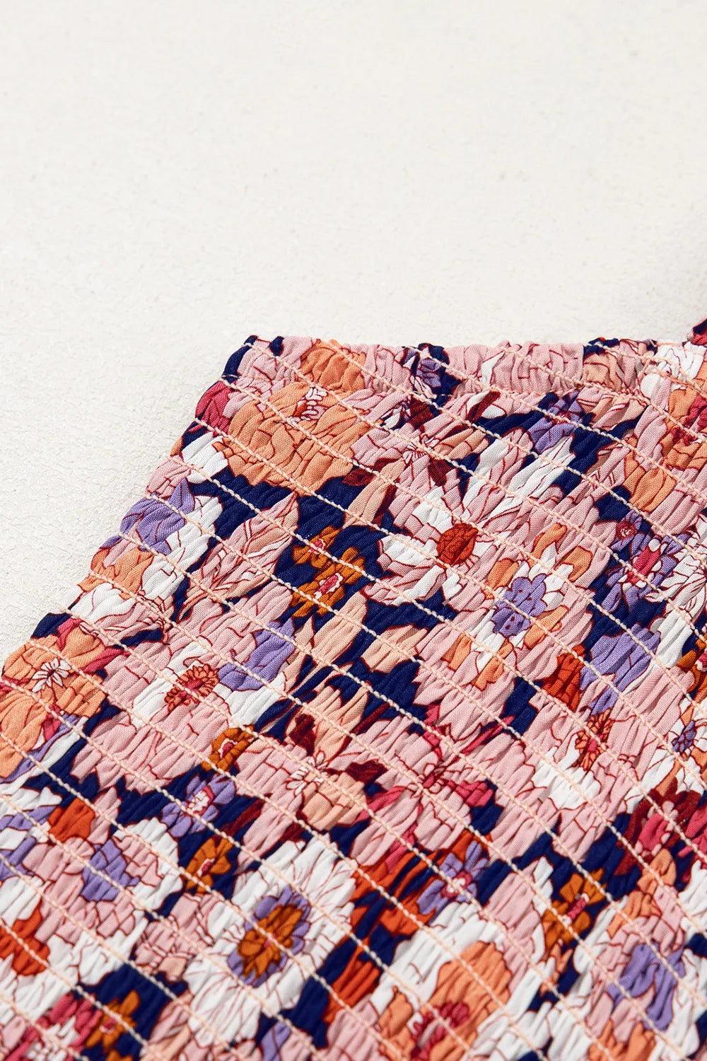 Bloom & Breeze Floral Smocked Jumpsuit