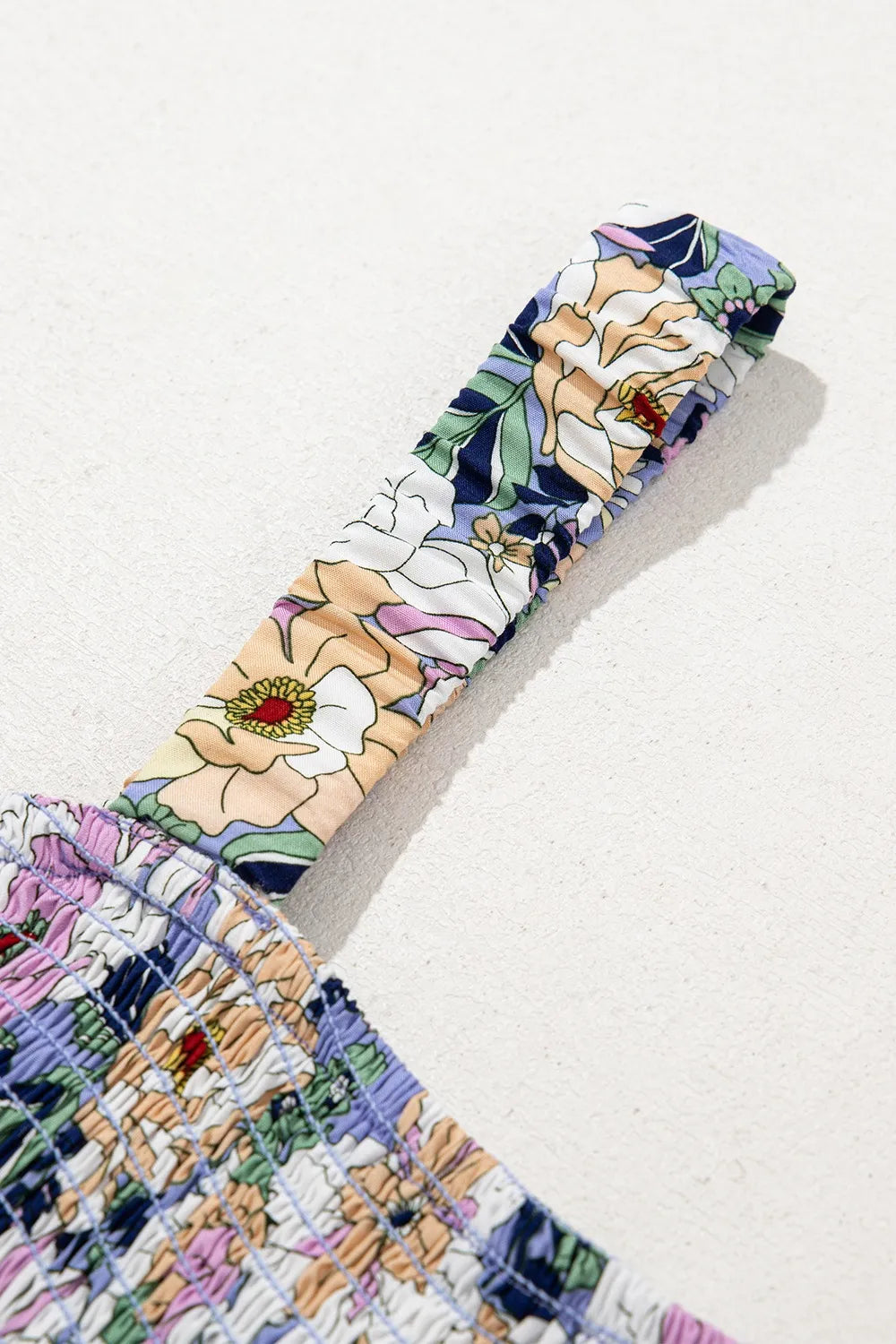 Bloom & Breeze Floral Smocked Jumpsuit