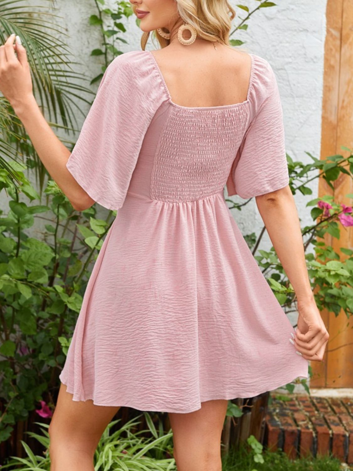Breezy Charm Smocked Flutter Dress